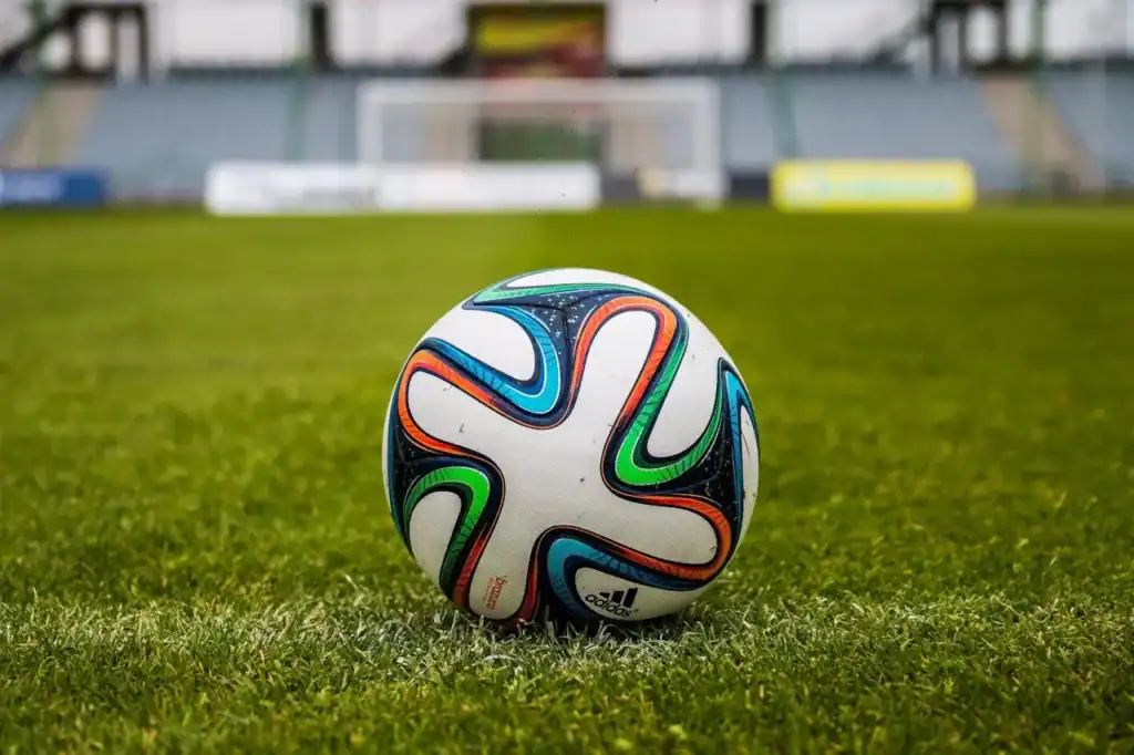 Soccer Ball In Grass Field