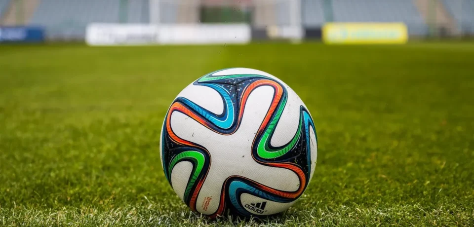 Soccer Ball In Grass Field
