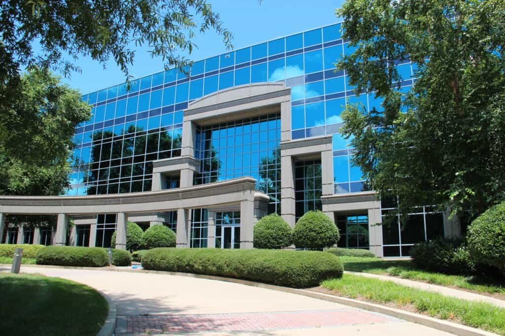 Johns Creek Georgia City Hall exterior, representing the community for a relocation guide